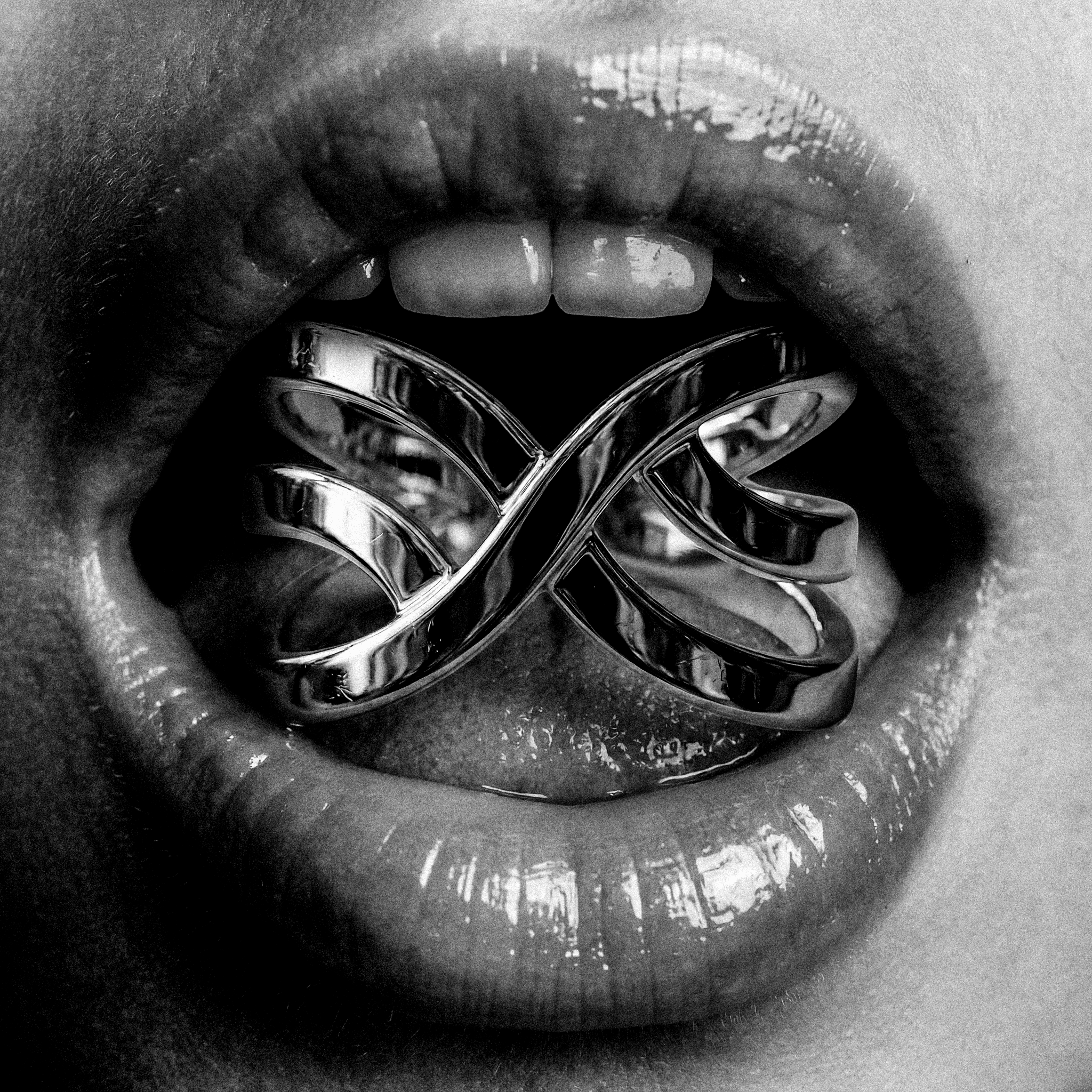 Close-up of lips holding the LXIX symbol in polished metal