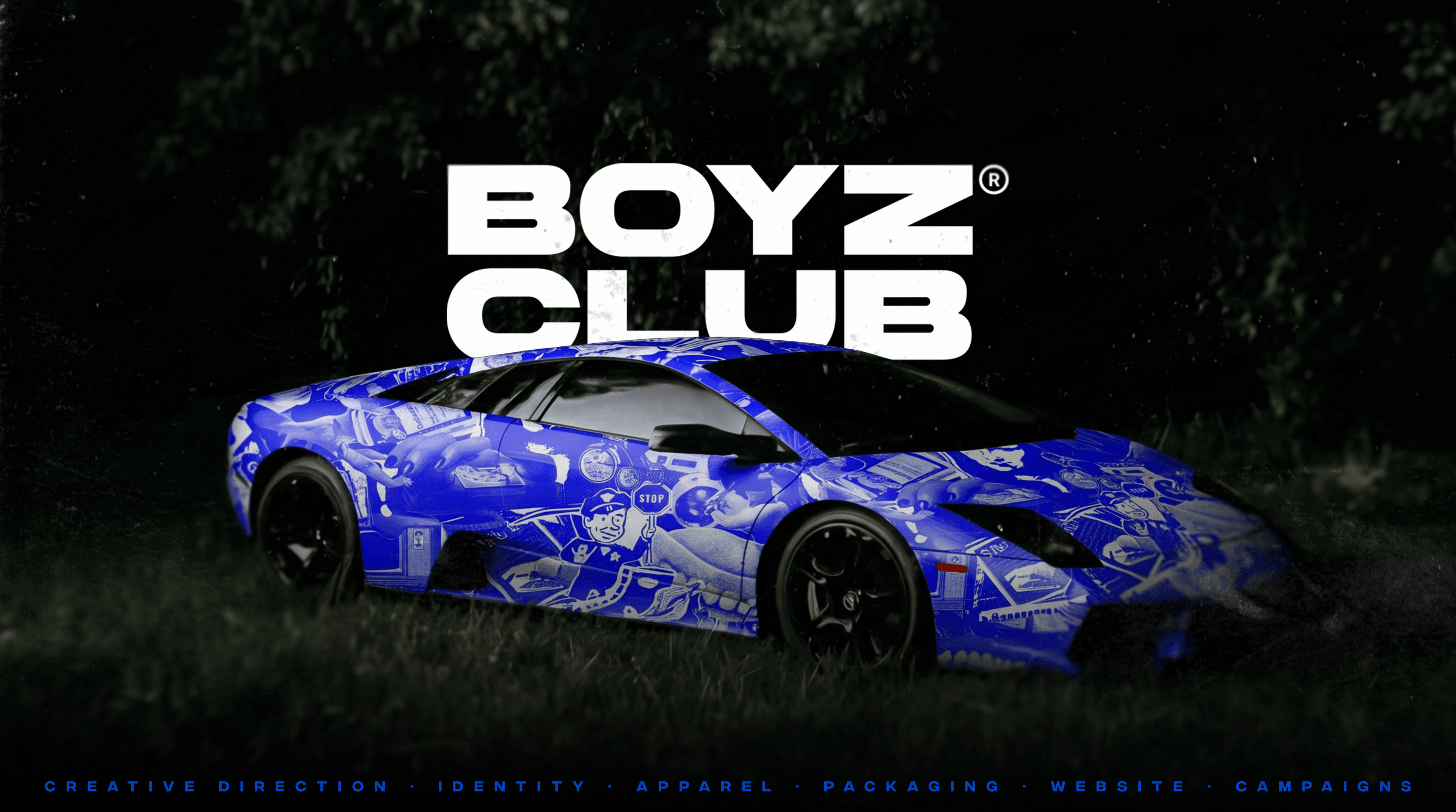 Camouflaged sports car with the BoyzClub wordmark