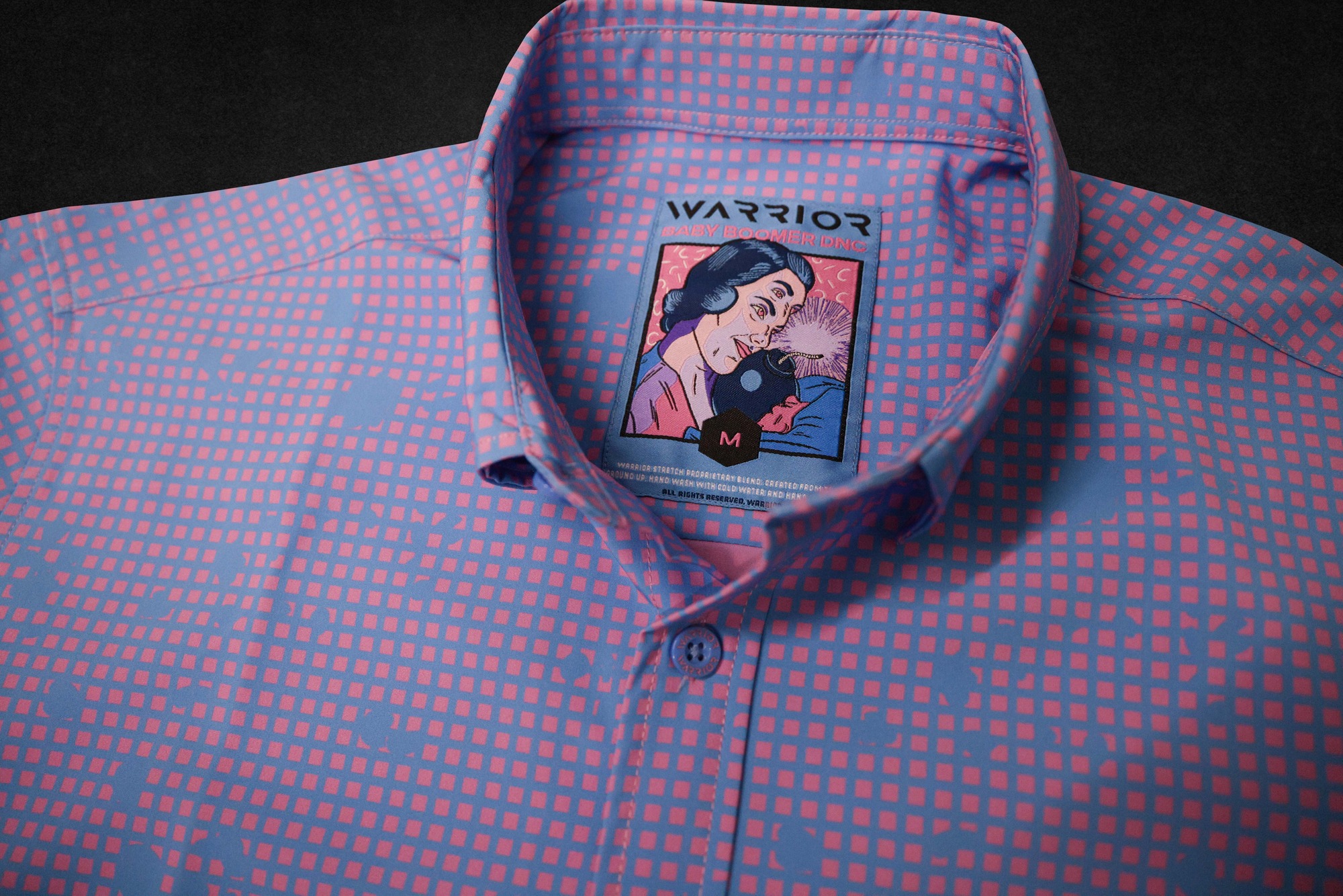 Baby Boomer DNC tag sewn into a pink and blue garment collar