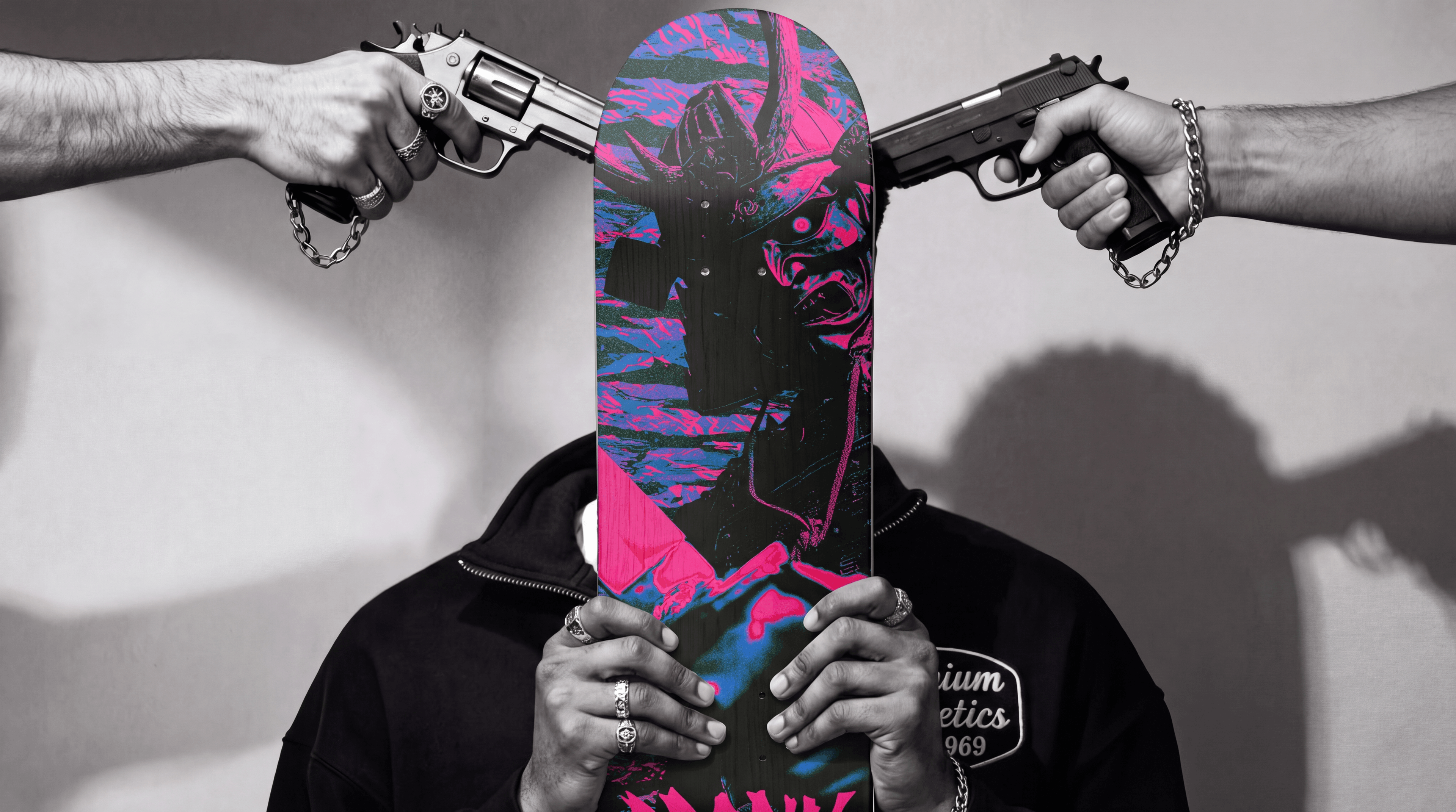 Figure holding the pink and blue samurai skateboard deck